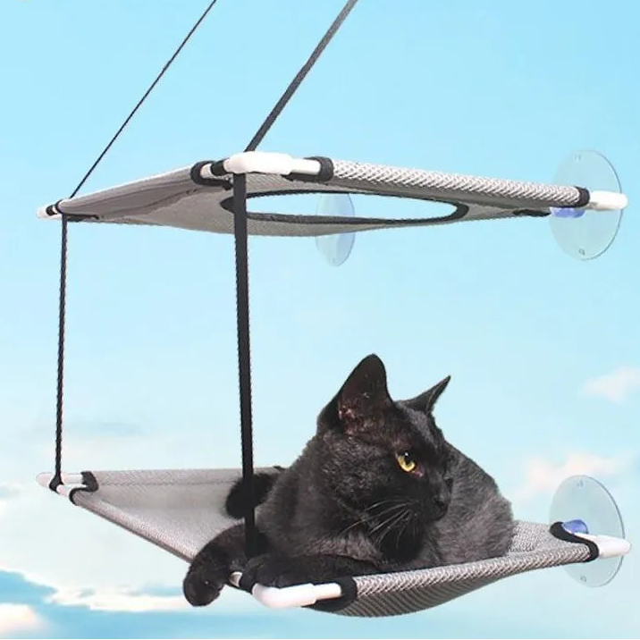 Hamac de fenêtre gris pour chat fixé par ventouses